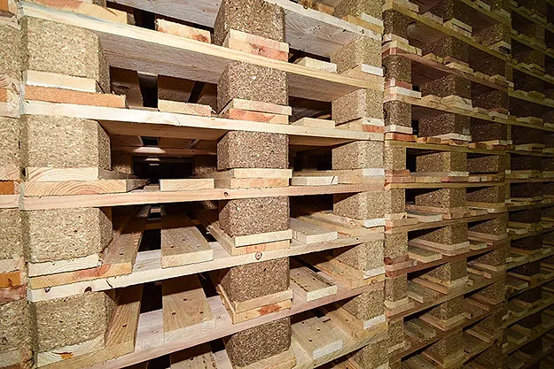 Stacked pallets close up: deck boards, blocks and bottom boards.